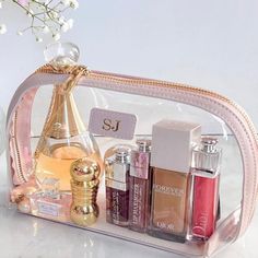 Our clear cosmetic case makes it quick and easy to find what you need. We love that you can wipe it clean and use over and over again. Personalize the front with your initials to make it special! Two letters work best for the monogram. Clear Rectangular Cosmetic Bag With Strap, Clear Cosmetic Bag With Zipper For Personal Use, Clear Zipper Pouch Cosmetic Bag For Personal Use, Clear Rectangular Cosmetic Bag For Organization, Clear Pouch Cosmetic Bag Gift, Clear Pouch Cosmetic Bag As Gift, Rectangular Clear Cosmetic Bag For Organization, Clear Rectangular Cosmetic Bag, Rectangular Clear Cosmetic Bag For Personal Use