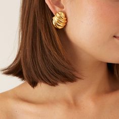 Capture the essence of coastal beauty with our Mar clip-on earrings. These easy-to-wear, 24K gold-plated earrings feature a shell-inspired design that adds a subtle nod to summer to any look. All jewelry is handcrafted and made to order in our New York City design studio. Please allow 7-14 business days for production from the order date. Measurements: 1 1/4" L x 1" W Beachy Necklace, Costa Rican, Launch Event, City Design, Classic Gold, Spring Trends, Hair Ornaments, Bridal Shop, Bridal Necklace