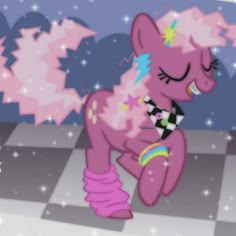 a pink pony sitting on top of a checkerboard floor with stars in the background