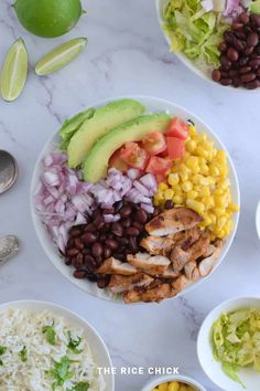 an image of a plate of food with beans, rice and avocado