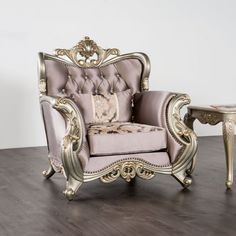 a chair and table sitting on top of a wooden floor