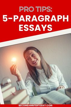 a woman holding a light bulb in her hand while sitting at a desk with books