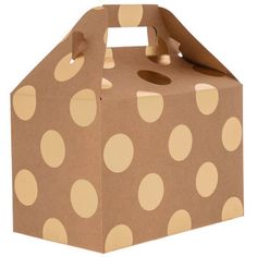 a brown box with white polka dots on the front and sides, sitting on a white background