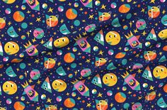 an image of colorful space fabric with stars and planets on it, in blue background