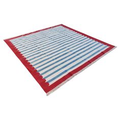 a red, white and blue striped rug