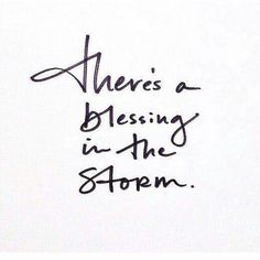 there's a blessing in the storm written on a piece of paper with black ink