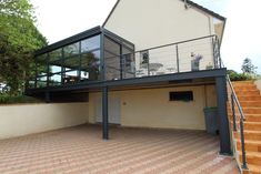 a house with stairs leading up to it