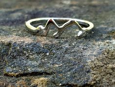 Sterling Silver Mountain Ring. Gift for Her, Lake District Gift, Hiking and Adventure Gift. Add a touch of outdoor adventure to your style with our Sterling Silver Mountain Ring. This unique piece of sterling silver jewelry features a detailed mountain range design, perfect for nature lovers and outdoor enthusiasts. Crafted in Cumbria, the heart of the Lake District, this ring is a beautiful way to carry a piece of the great outdoors with you wherever you go.  Available in a number of sizes, thi Nature-inspired Sterling Silver Rings For Gifts, Mountain Ring Women, Young In The Mountains Ring, Mountain Pendant, Silver Mountain Ring, Mountain Ring, Go Your Own Way, Adventure Gifts, Cumbria