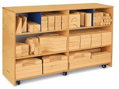 a wooden shelf filled with lots of boxes