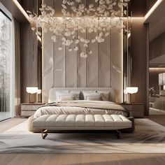 a bedroom with a large bed and chandelier hanging from the ceiling