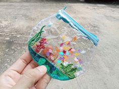 Tiny Fish Bowl Glitter Clear Wallet, transparent coin purse, clear pouch, Aquarium Fish, jelly wallet Details measures Height:    3.5 " Width:      4" Clear Things, Fun Things To Buy, Fish Bag, Tiny Fish, Clip Wallet, Cute Little Things, Money Clip Wallet, Aquarium Fish, Bits And Bobs