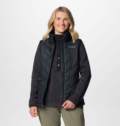 Stay warm to the core. The perfect outer layer for chilly weather, this vest combines synthetic insulation, thermal-reflective lining, and light-rain-repellent tech to keep you toasty and dry. Parka Vest, Lightweight Vest, Vest Shirt, Plus Size Shopping, Womens Fleece, Water Resistant Fabric, Snow Suit, Columbia Sportswear, Rain Wear