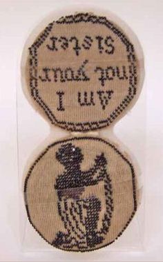 two patches with words on them and an image of a man holding a bird in his hand