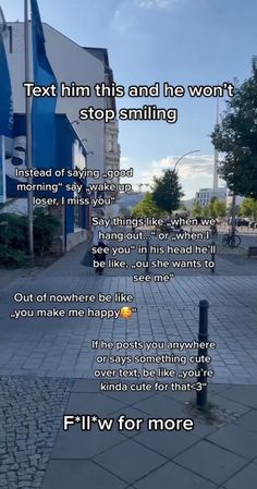 a poem written on the side of a building in front of a blue and white building