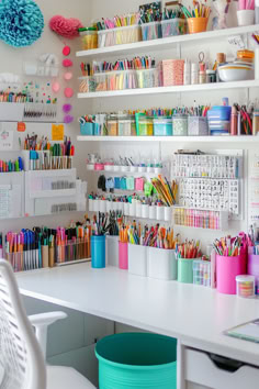 craft room with white desk work table craft room organizers chair craft supplies Small Craft Workspace Ideas, Wall Shelves For Art Supplies, Art Storage Shelves, Organizing Crafting Supplies, Storage For Arts And Crafts, Wall Storage Craft Room, Craft Shelves Organizing, Craft Room Essentials, Small Craft Corner Ideas