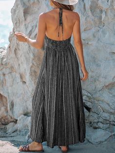 This Cabo Holiday Printed Backless Maxi Dress is perfect for any special occasion. It boasts a grey printed pattern and features an open backless design for a stylish and feminine look. Made of high-quality fabric, the dress is comfortable, breathable, and durable. Get ready to turn heads! Rayon/CottonPull On ClosureDry Clean Only Size ChartXS = Dress 0-2, Bust, 31"-32.5", Waist 23"-24Small = Dress 4-6, Bust,33"-35", Waist 25-26", Hips 35"-37"Medium = Dress 8-10, Bust 35-36" Waist 27-28", Hips 3 Bohemian Backless Maxi Dress With Smocked Back, Halter Neck Dress With Smocked Back For Beach Season, Vacation Backless Maxi Dress With Smocked Back, Backless Sundress With Smocked Back For Beach, Backless Sundress With Smocked Back, Sundress With Smocked Back Maxi Length, Sundress Style Backless Maxi Dress With Smocked Back, Bohemian Party Dress With Smocked Back, Elegant Backless Dress With Smocked Back For Beach