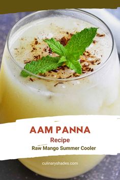 a drink in a glass with mint garnish on top and the words aam panna recipe raw mango summer cooler