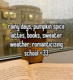 an open book with the words rainy days, pumpkin spice lattes, books, sweater weather