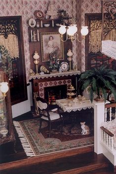 an old fashioned doll house with furniture and decor