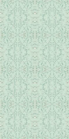 a green and white wallpaper pattern with small leaves on the bottom right hand corner