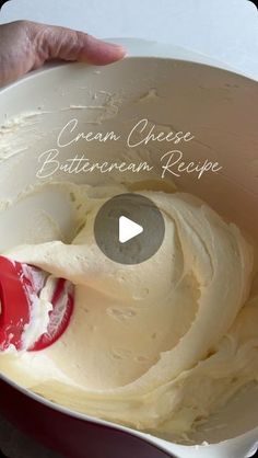 a person mixing batter in a bowl with a red spatula on the side and text overlay that reads cream cheese buttercream recipe