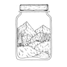 a jar filled with water sitting on top of a white table next to a mountain