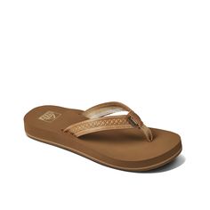 PRICES MAY VARY. CLASSIC FLIP FLOPS: Reef's Cora flip flops are handcrafted to be with you no matter where your next adventure takes you. The classic design and versatility means you can seamlessly go from brunch to the beach. NO BREAK-IN PERIOD: Packed with the extra comfort of Reef’s anatomical arch support, the Reef Cora sandal will keep your feet comfortable no matter where they take you. SUPERIOR STRAPS: PVC free synthetic straps using a 30% recycled antique metal hardware logo and 100% rec Cute Flip Flops, Brown Flip Flops, Hardware Logo, The Reef, Kids Luggage, Antique Metal, Metal Hardware, Pharmacy Gifts, People Around The World