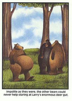 two brown bears standing next to each other in front of trees and grass with the caption