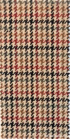 a close up of a plaid pattern on fabric