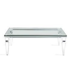 a glass coffee table with metal legs and a clear top on an isolated white background