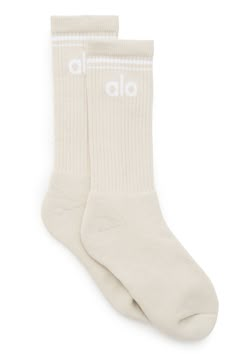 Instant classic. The Unisex Throwback Sock has all the features of a fave: a super-soft feel, comfy cushioning and classic stripe detail. Wear it tall or scrunched with leggings or shorts and your go-to sneakers. Comfy cushioning Wear it tall or scrunched Alo Yoga® | Throwback Socks in Bone/White, Size: Medium Aesthetic Socks, Yoga Socks, Bone White, Tube Socks, Back Women, Shopper Tote, Alo Yoga, Men Looks, Yoga Clothes