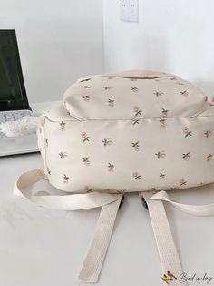 BirdinBag - Functional Floral Graphic Backpack Featuring a Bag Charm Casual Backpack Shoulder Bag For Study, Trendy Study Pouch Bag, Back To School Casual Pouch Bag, Casual Back To School Pouch Bag, Cute Beige Backpack Bag, Beige Bag For Study And Back To School, Cream School Pouch Bag, Casual Pouch Backpack For School, Casual School Backpack In Pouch Shape