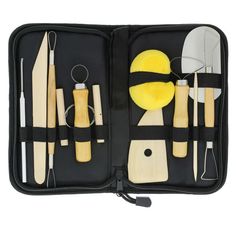 an assortment of kitchen utensils in a black case