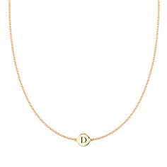 Our Initial Collection is subtle, easy and made to follow your lifestyle, like a second skin: Small enough to sleep in and never take off. The Solitaire Initial Necklace in solid 14k gold is available in various lengths. The initial is engraved on both sides of the disc so it's ok if it flips! After the initial is engr Necklace Initial Letter D, Minimalist Round Name Necklace, Minimalist Initial Round Disc Necklace, Minimalist Monogram Initial Necklace In White Gold, Minimalist Round Disc Initial Necklace, Dainty Yellow Gold Monogram Initial Necklace, Minimalist White Gold Monogram Initial Necklace, Classic Round Pendant Initial Necklace, Minimalist Yellow Gold Round Pendant Name Necklace