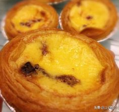 several pastries sitting on top of metal pans