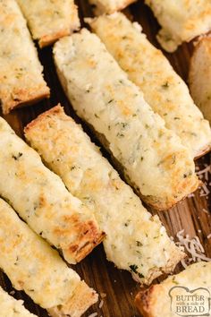 bread sticks with cheese and parmesan sprinkled on top