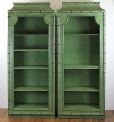 two green bookcases sitting next to each other