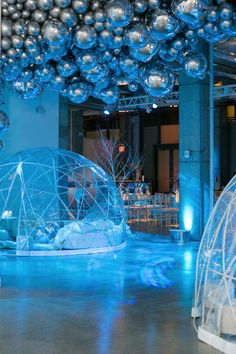 a room filled with lots of blue and silver ornaments