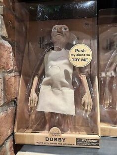 two action figures from the animated movie, dobby and hush my ghost to try me