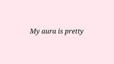 the words, my aura is pretty on a pink background with black text below it