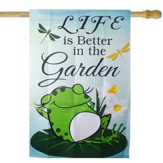 a green frog sitting on top of a lily pad with the words life is better in the garden