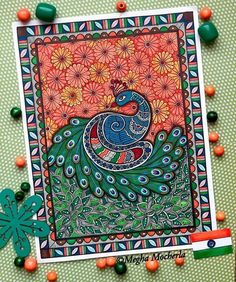 an art card with a peacock on it and beads around the edges, surrounded by flowers