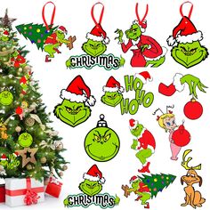 the grinly christmas tree is decorated with green and red ornaments, which include santa's hats