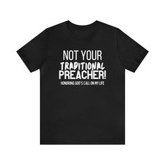 a black t - shirt with white writing that says not your traditional preacher, i'm