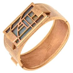 This stunning and artistic gold plated hinged signed Monet cuff bracelet is like a studio piece that has stained glass like resin on the front. The soft subtle colors of the interior mosaic like design are pink, turquoise, yellow and a hint of purple in iridescent color form. It is hinged and hugs a small wrist beautifully. Very artisan looking. This is a very unusual bracelet by Monet. This will fit a small wrist of size 6 or 6.5 max. The resin bar across the top is 1.85" W x 1" D. Ceramic Cuff Bracelet, Monet Costume Jewelry, Turquoise Resin, Iridescent Color, Elephant Jewelry, Aesthetic Movement, Jewelry Techniques, Pink Turquoise, Costume Jewelry