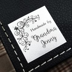 a close up of a piece of cloth with a label on it that says handmade by grandma jenny