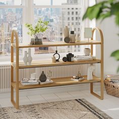 a wooden shelf sitting in front of a window