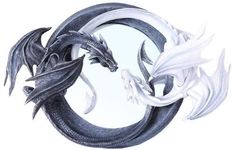 two black and white dragon in a circle