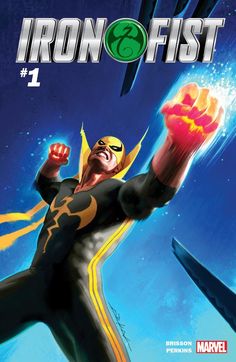 the cover to iron fist 1, featuring an image of a man with his arms in the air