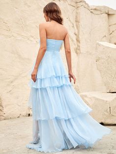 Product Code:FSWD8095 Embellishment: Chiffon Fabric: 100% Polyester Back Style: Zipper Up Fully Lined: Yes Built-in Bra: Yes Available Color: Blue Stretch: Moderate Fits true to size Imported Model Information: Height: 5' 2" Bust: 33.5'' Waist: 24“ Hips: 35.5” wearing US size Small Highschool Dance, Moh Dress, Layered Prom Dress, Blue Ruffle Dress, Wedding Party Outfits, Blue Gown, April 27, Party Outfits, Formal Dresses Prom